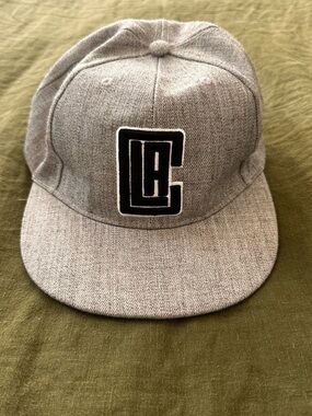 Heather Gray Snapback Hat with LA Clippers Monogram Patch